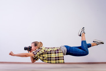 different photographer poses: bending, squatting, lying down