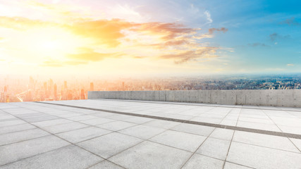 Panoramic city skyline and buildings with empty square floor