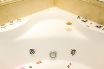 Ceramic tub and rose petals