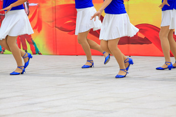 White dress and blue shoes