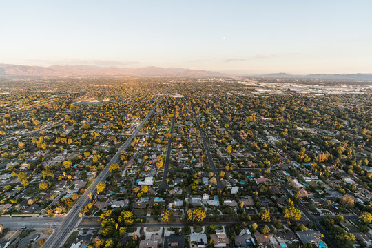 Late afternoon aerial view of San Fernando Valley homes and streets of Los Angeles, California.