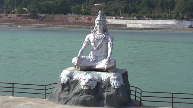 Statue Shiva, hindu idol on the river Ganges, Rishikesh, India