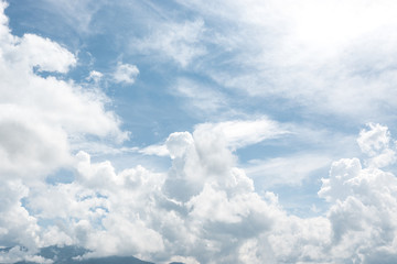 Naklejka na ściany i meble Blue sky and beautiful cirrus clouds in a sunny day.