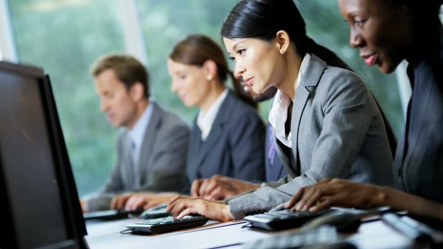 Professional multi ethnic business people wearing smart city suits working in center trading stocks shares in city office 