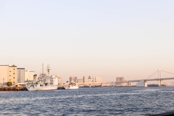 View of Rainbow bridge and boat at sumida river viewpoint in tokyo,Japan