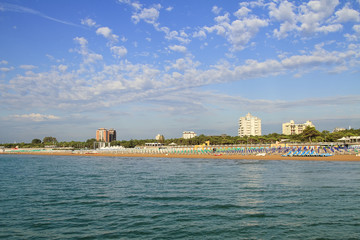 Naklejka premium The sandy beach at Jesolo on a sunny summers day