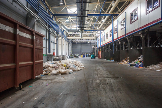 Modern waste recycling processing plant. Separate garbage collection, trash sorting. Recycling and storage of waste for further disposal.