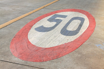 50 kilometers per hour sign on the road