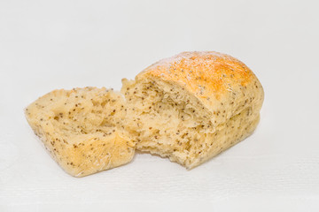 broken-down, porous loaf of freshly baked white bread with Chia seeds