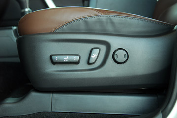Buttons for adjusting seat position