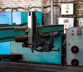 Fototapeta na wymiar Machine for modern plasma laser cutting of metal, cutting of metal by plasma and laser, automated