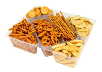 Keuken spatwand met foto Pack of savoury pretzel and cracker snack mix isolated on a white background © philip kinsey