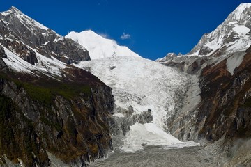 Glacier No. 1 in Hailuogou valley with Mt. Gongga and blue sky in the background, Sichuan, China 