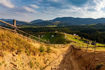 Perspective view of the steeply descending dirt road