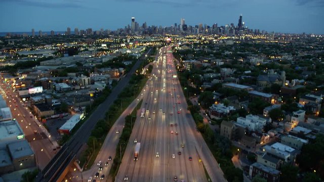 Aerial overhead view at sunset of busy freeway traffic Chicago Illinois US