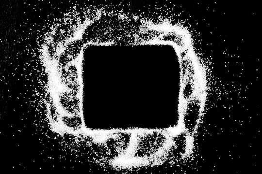 Empty square checking box symbol drawing by finger on white snow salt powder spot cloud in center on black background. Tick concept with place for text. Copy space.