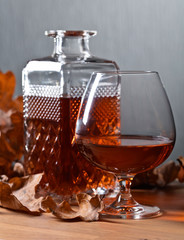 Brandy and dried up oak leaves .