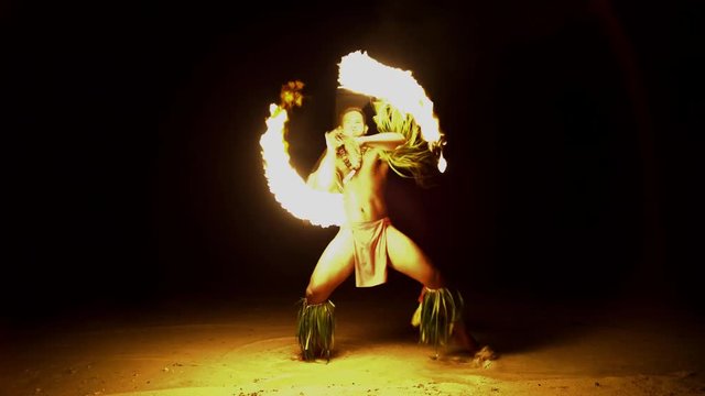 Male Fire Dancer With Illuminated Spinning Flaming Torch Performing The Art Of Fire Dancing A Traditional Culture In French Polynesia South Pacific