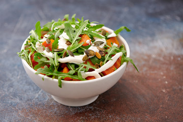 garden with pumpkin and arugula