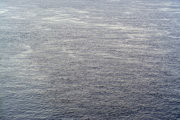 Texture of dark water with light waves