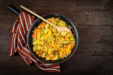 Stewed vegetables, vegetables pan, vegetarian food, top view