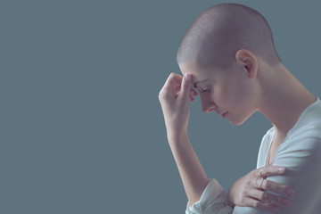 Sad, frightened and depressed female cancer patient portrait with copy space. Breast cancer...
