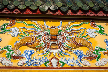 Dragon decorations. Imperial Royal Palace of Nguyen dynasty in Hue, Vietnam. Unesco World Heritage Site.Imperial Royal Palace of Nguyen dynasty in Hue, Vietnam. Unesco World Heritage Site.