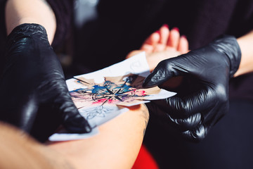 Tattoo artist in a studio