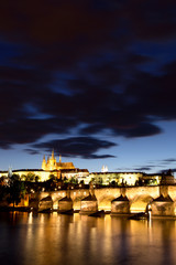 Fototapeta na wymiar Prague Castle with Charles Bridge at Dusk