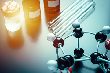 molecular formula and laboratory equipment on a blue background. Science organic chemistry concept