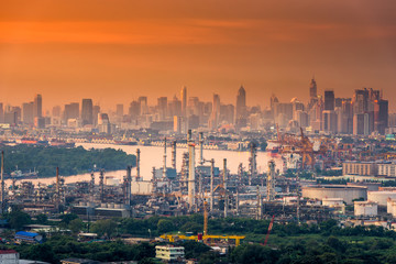 Landscape of Oil Refinery Plant and Manufacturing Petrochemical at Twilight Sunset Scenic View,Industry of Power Energy and Chemical Petroleum Product Factory. Cityscape Scenery and Industrial Area