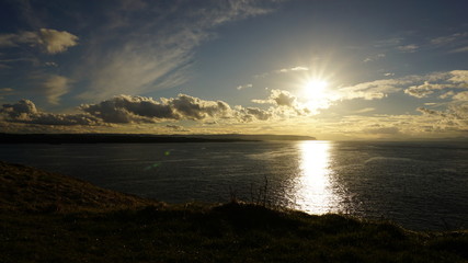 sea with blue sky and clouds
