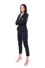 Attractive elegant successful business woman looking at camera and smile. Full body isolated on white background. 