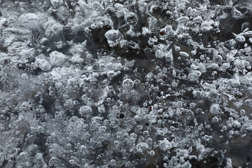 Details and bubbles on the ice of a glacier