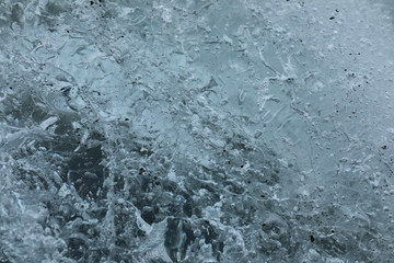 Details and bubbles on the ice of a glacier
