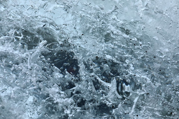 Details and bubbles on the ice of a glacier