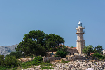 Port de Pollensa, Mallorca, Spain - July 19, 2013: Lighthouse Punta de la Avanzada