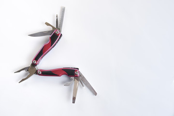 Red open multitool with pliers knife screwdriver bottle opener saw all-in-one instrument