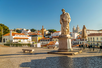 Fototapeta na wymiar Portas do Sol terrace and square with Saint Vicncent statue in Alfama, historical centre of Lisbon
