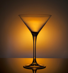 Glass cocktail glass outlined with light