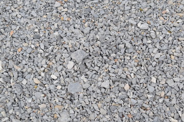 texture of gravel and stone in various size on the ground.