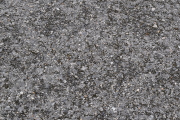 ruined asphalt road with rough and crack surface.