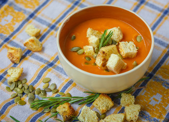 pumpkin vegan soup with croutons and rosemary