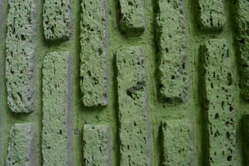 old and dirty green brick wall