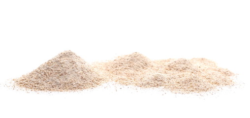 Pile of integral wheat flour isolated on white background