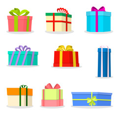 Set of large colorful boxes with beautiful colored ribbons. A large number of different gifts.