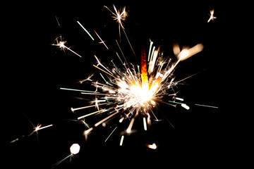 Bengal lights. Holiday and birthday Sparkler decoration. The festive bright. Background with a sparkler. Sparkler Bokeh Colorful sparkler.