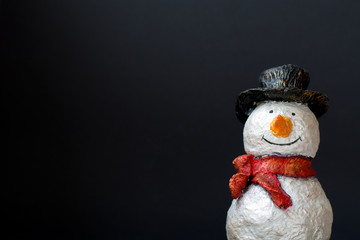 Snowman on black background