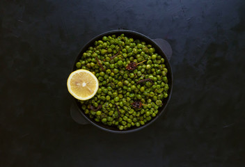 Indian Spiced Peas. Traditional Indian garnish of fried green peas with spices.