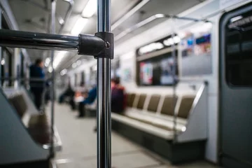 Zelfklevend Fotobehang Abstract chrome handrails in subway wagon interior © Aleksander